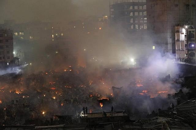 Several hundreds of shanties burnt to ashes in Chalantika Slum fire in the capital`s Mirpur on 16 August, 2019. Photo: Dipu Malakar