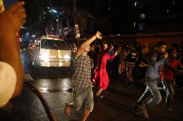Injured people in Chalantika Slum fire in the capital`s Mirpur being rushed to a hospital on 16 August, 2019. Photo: Dipu Malakar