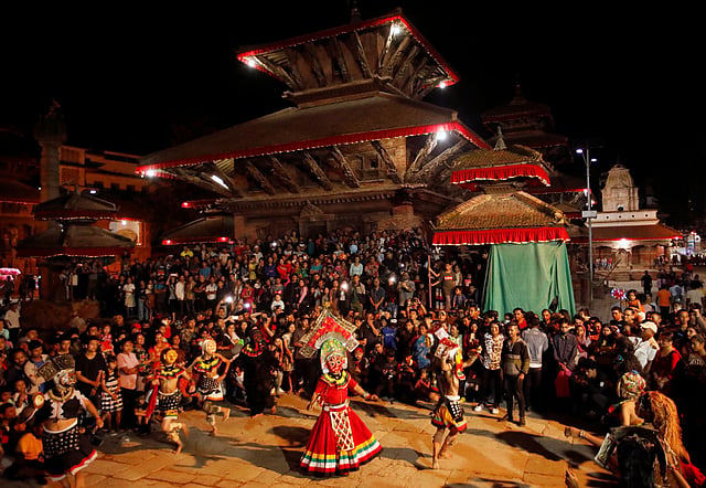 Masked dancers perform a traditional mask dance during the Indra Jatra Festival in Kathmandu, Nepal on 11 September 2019. Photo: Reuters
