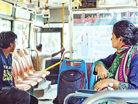 Kaneez seated in the bus designed by herself. Photo: Collected
