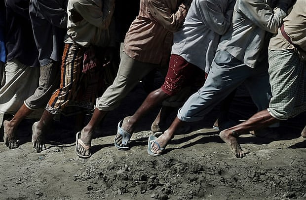 Nearly 25,000 people work in the dozens of ship-breaking yards, steel-rolling mills and factories. Photo: The Guardian