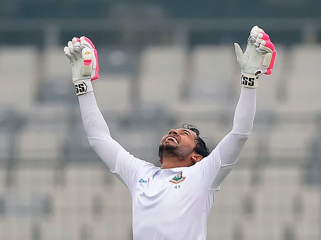 Bangladesh`s Mushfiqur Rahim reacts after scoring a double century (200 runs) during the third day of a Test cricket match between Bangladesh and Zimbabwe at the Sher-e-Bangla National Cricket Stadium in Dhaka on 24 February, 2020. Photo: AFP