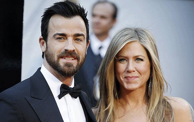 জেনিফার অ্যানিস্টন ও জাস্টিন থেরোক্স। ছবি: রয়টার্স