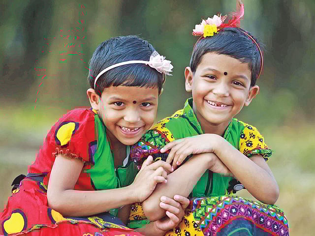 কনজয়েন্ড টুইনস মণি-মুক্তাকে জোড়া থেকে আলাদা করা হয়েছিল। আজ প্রথম স্কুলে যাবে তারা। দিনাজপুরের শতগ্রাম পালপাড়া থেকে বৃহস্পতিবার তোলা ছবি l প্রথম আলো
