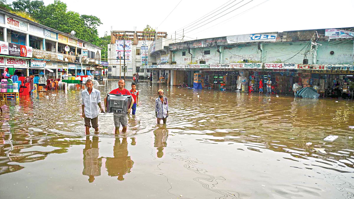 মুন্সী কবির উদ্দিন সড়ক ও শহীদ ধীরেন্দ্রনাথ দত্ত স্টেডিয়াম মার্কেট এলাকা​র চিত্র l প্রথম আলো