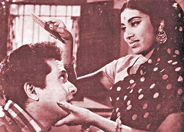 জীবন থেকে নেয়া ছবির দৃশ্যে রাজ্জাক ও সুচন্দা