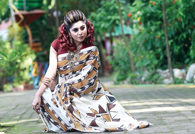 শাড়ি গ বিভাগে প্রথম মেঘ রোদ্দুর। মডেল: প্রিয়াঙ্কা প্রিয়া