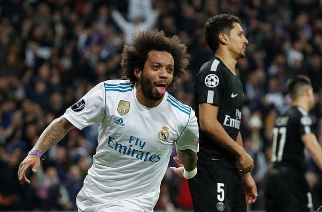 দলকে নিরাপদ দূরত্বে নেওয়ার পর মার্সেলো।  ছবি: রয়টার্স