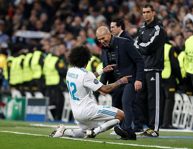 জিদানের মুখে হাসি ফোটাল তাঁর দল।  ছবি: রয়টার্স