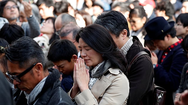দিনটি স্মরণে স্থানীয় সময় পৌনে তিনটার দিকে জাপানির একযোগে নীরবতা পালন করেন। টোকিও, জাপান, ১১ মার্চ। ছবি: রয়টার্স