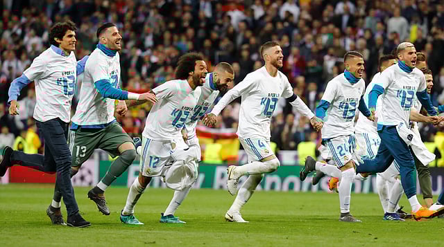 ফাইনালে ওঠার আনন্দে রিয়াল খেলোয়াড়দের বাঁধভাঙা উল্লাস। ছবি: রয়টার্স