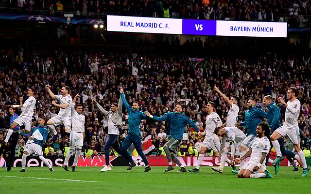 ফাইনালে ওঠার আনন্দে রিয়াল খেলোয়াড়দের বাঁধভাঙা উল্লাস। ছবি: এএফপি