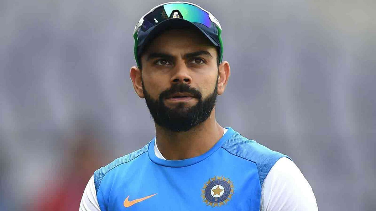 সারেতে কোহলি টাকার জন্য নয়, খেলবেন দেশের প্রয়োজনেই। ছবি: এএফপি