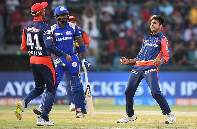 মুম্বাইয়ের বিপক্ষে ৩ উইকেট তুলে নেন নেপালের স্পিনার লামিচান। ছবি: এএফপি