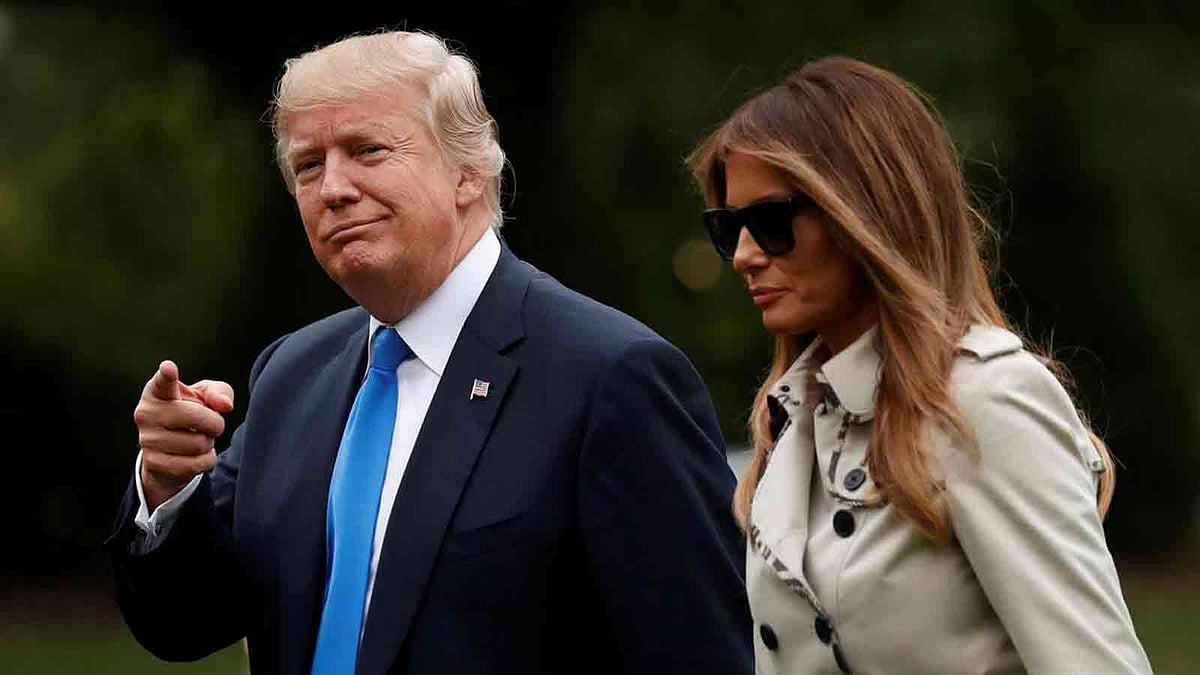 ডোনাল্ড ট্রাম্প ও মেলেনিয়া।