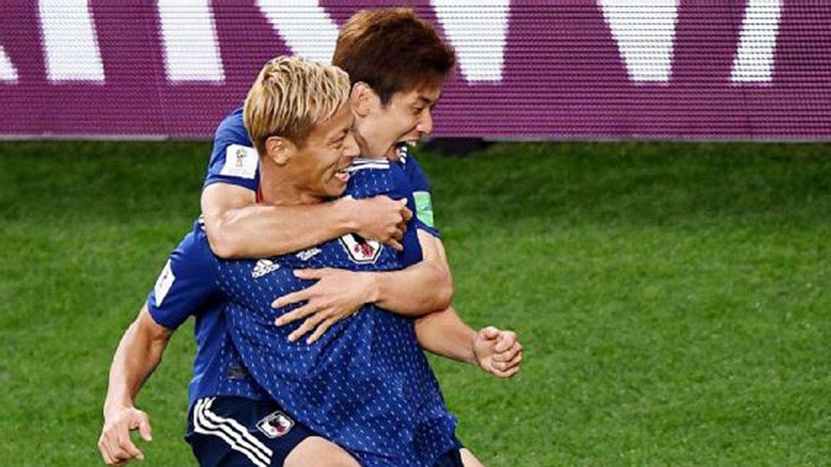 সমতায় ফিরে জাপানের ফুটবলারদের উচ্ছ্বাস। ছবি: এএফপি