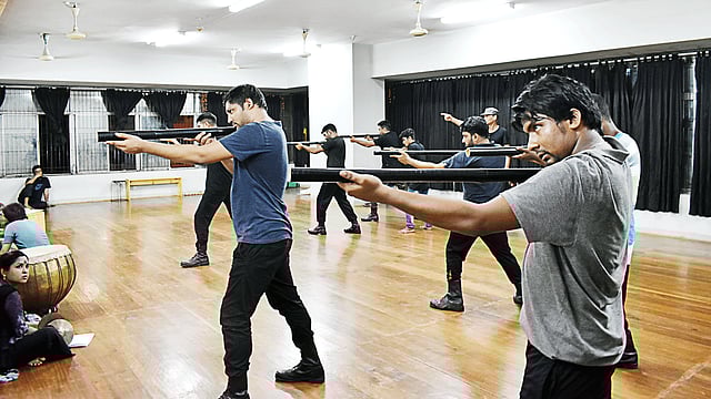 ‘শ্রাবণ ট্র্যাজেডি’ নাটকের মহড়ায় শিল্পীরা