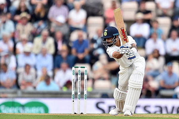 আরেকটি মাইলফলক ছুঁয়ে ফেললেন কোহলি। ছবি: এএফপি