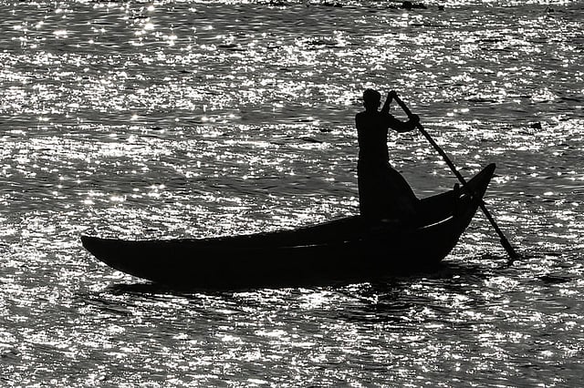 খালি নৌকা নিয়ে নদীর বুকে।