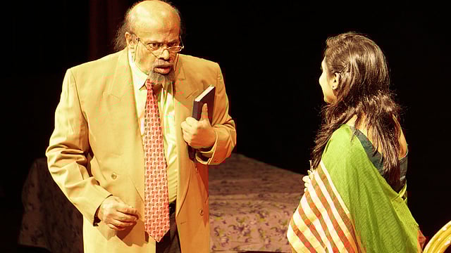 ‘দেবী’ নাটকের একটি দৃশ্য