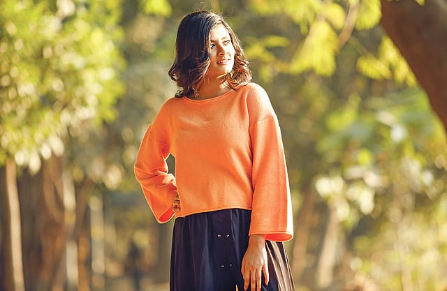 ওম দেবে এমন টপ। পোশাক: মার্জিন