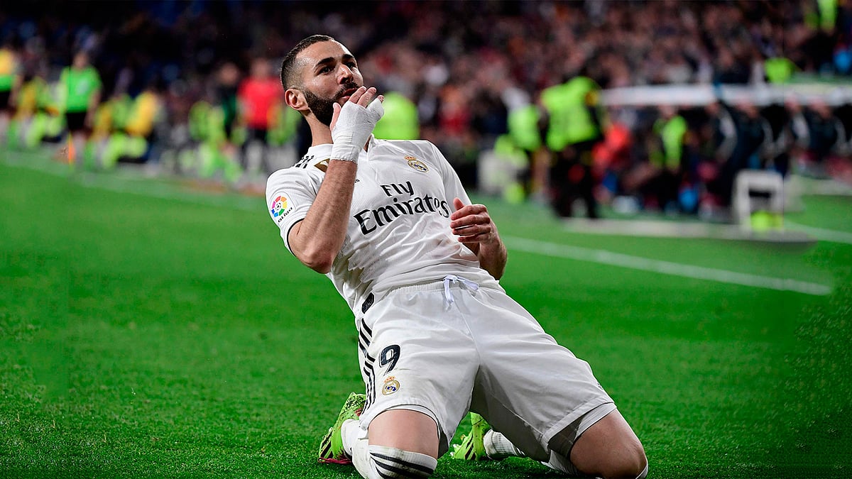 কাল শেষ মুহূর্তে দলকে জিতিয়ে রেকর্ডও করেছেন বেনজেমা। ছবি: এএফপি