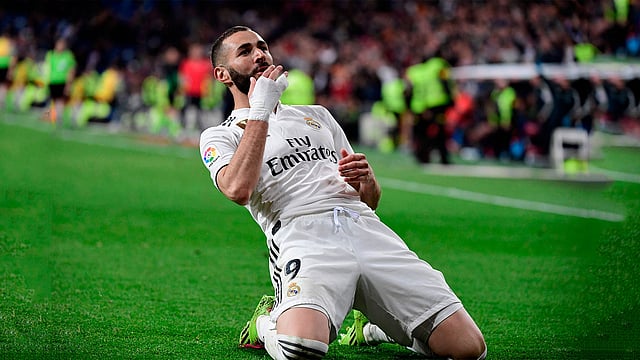 কাল শেষ মুহূর্তে দলকে জিতিয়ে রেকর্ডও করেছেন বেনজেমা। ছবি: এএফপি