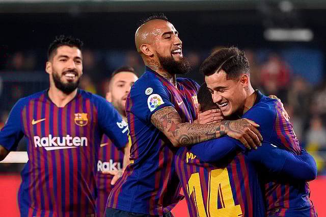 কুতিনহোর গোলের পর সতীর্থদের উদ্‌যাপন। ছবি: এএফপি