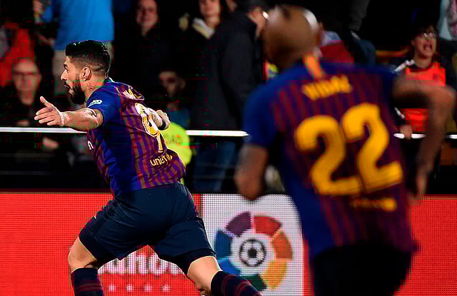 মেসির কর্নার থেকে পাওয়া বলে গোল করেছেন সুয়ারেজ। ছবি: এএফপি