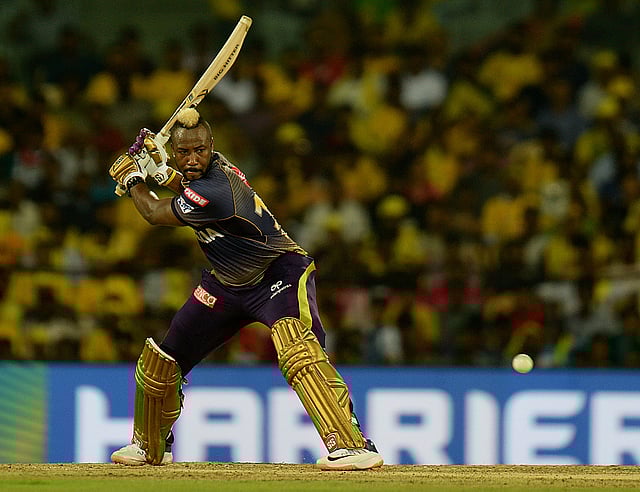 রাসেলের ঝড়ে প্রায় হেরে বসা ম্যাচেও জয় পাচ্ছে কলকাতা। ছবি: এএফপি