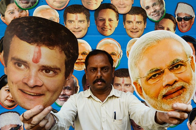 সমালোচকেরা বলছেন, মুখে কংগ্রেসের কঠোর সমালোচনা করলেও আদতে সাবেক কংগ্রেস নেত্রী ও ভারতের সাবেক প্রধানমন্ত্রী ইন্দিরা গান্ধীর পদাঙ্কই অনুসরণ করতে চাইছেন নরেন্দ্র মোদি। ছবি: এএফপি