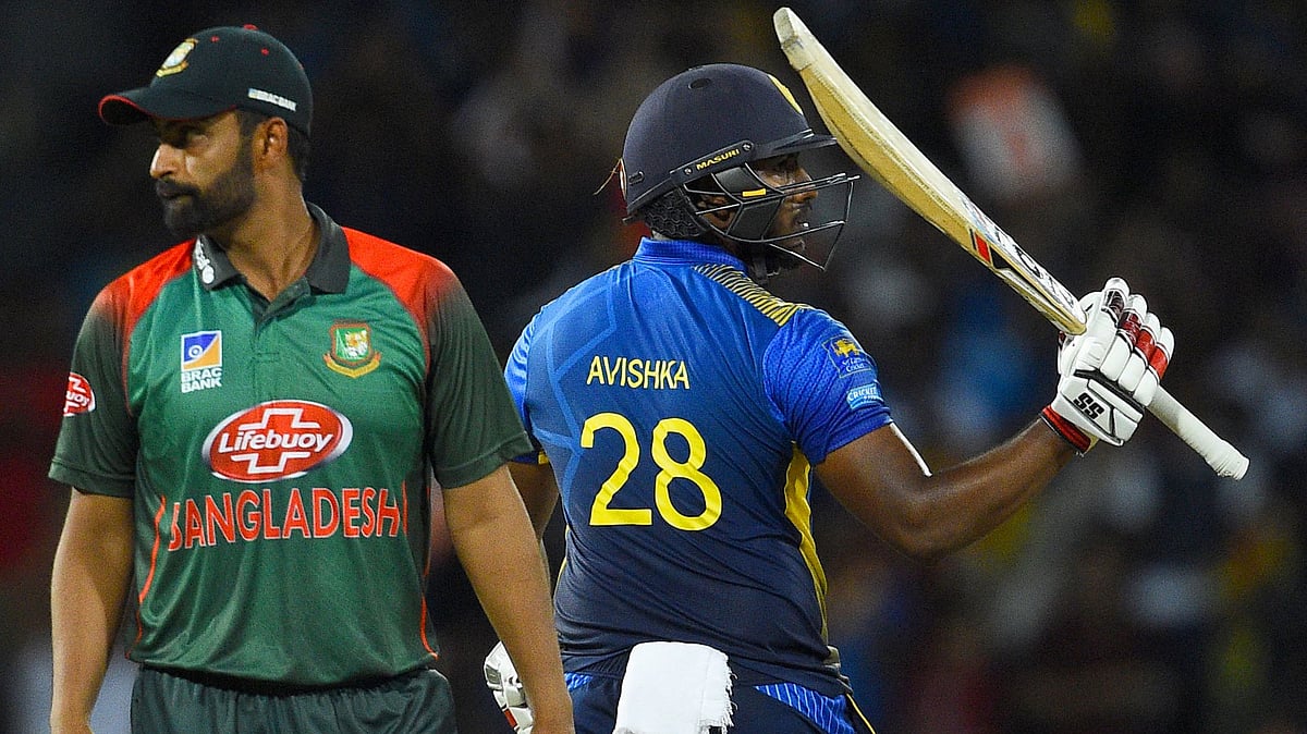 অভিষ্কা ফিফটি উদযাপন করছেন, হতাশ তামিম—পুরো ম্যাচের চিত্র তুলে ধরছে এ ছবি। ছবি: এএফপি