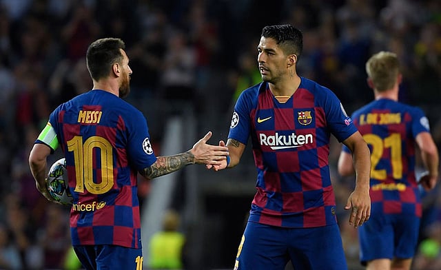 আজকের ম্যাচে বার্সার জয়ের দুই নায়ক মেসি ও সুয়ারেজ। ছবি: এএফপি
