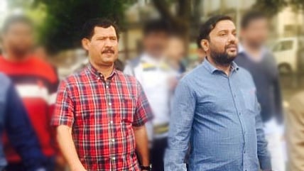 ইসমাইল হোসেন সম্রাট ও এনামুল হক আরমান (বাঁয়ে)। ছবি: সংগৃহীত