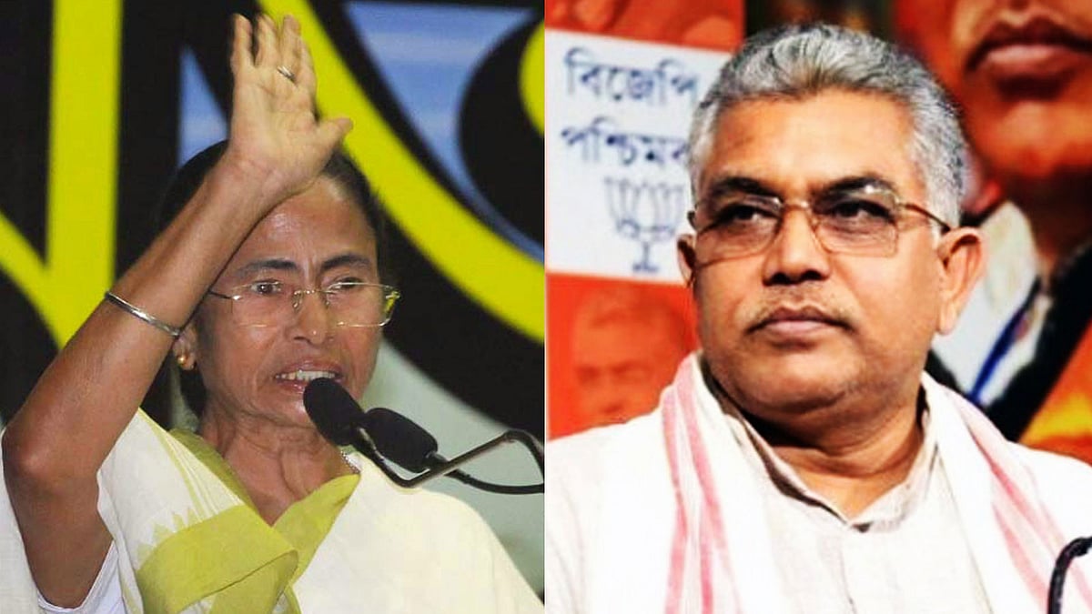 মমতা বন্দ্যোপাধ্যায় ও দিলীপ ঘোষ। ছবি: ভাস্কর মুখার্জি