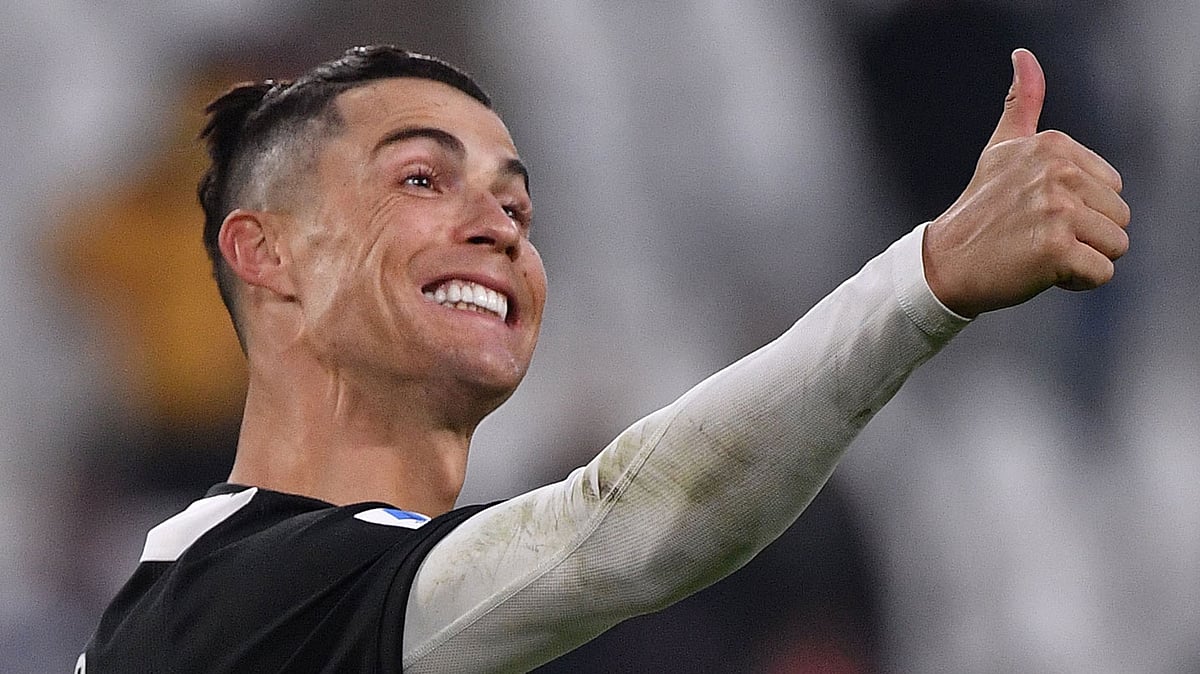 হ্যাটট্রিকের পর ক্রিস্টিয়ানো রোনালদো। ছবি: এএফপি