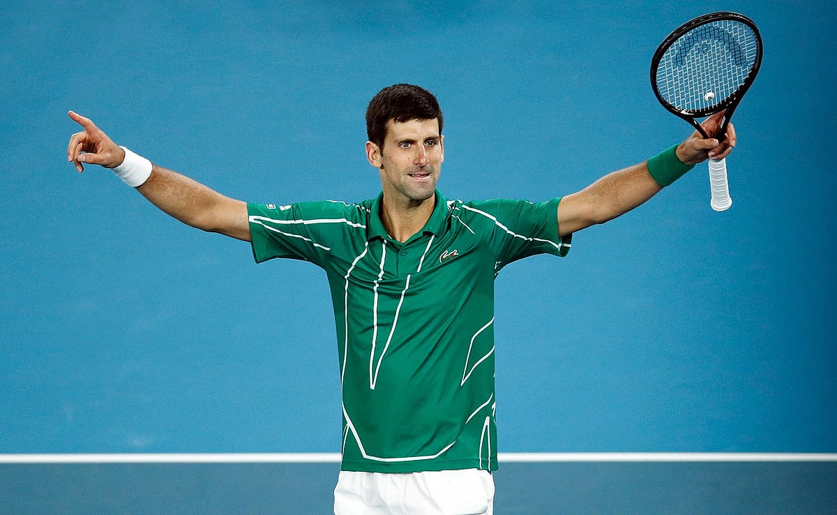 অষ্টমবারের মতো অস্ট্রেলিয়ান ওপেন জিতলেন নোভাক জোকোভিচ। ছবি: রয়টার্স