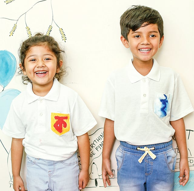 শিশুর হাতে অাঁকা অক্ষর ফুটে উঠুক পোশাকে