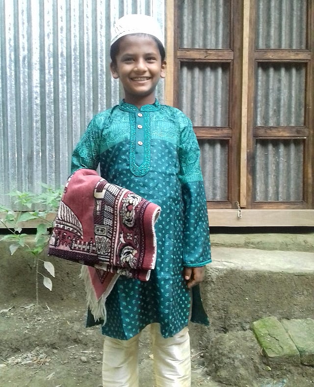 ঈদের দিনের এই ছবিটি পাঠিয়েছেন নাহিদ জুলফিকার। তিনি লিখেছেন, মহামারির দিনে শিশুর মুখে হাসির কারণ এই ঈদ।