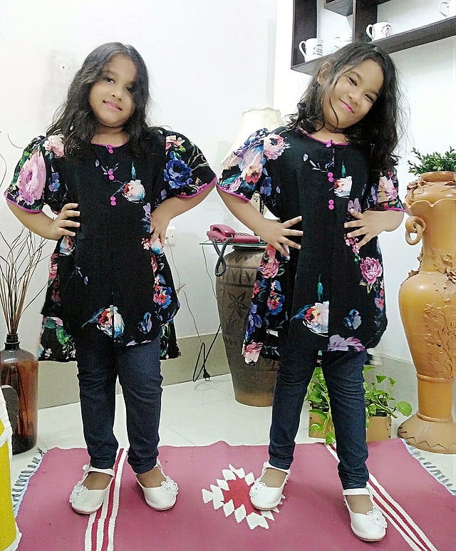 ঈদের দিনে কুমিল্লার আহমেদ কাদেরের পরিবারের সদস্যরা।