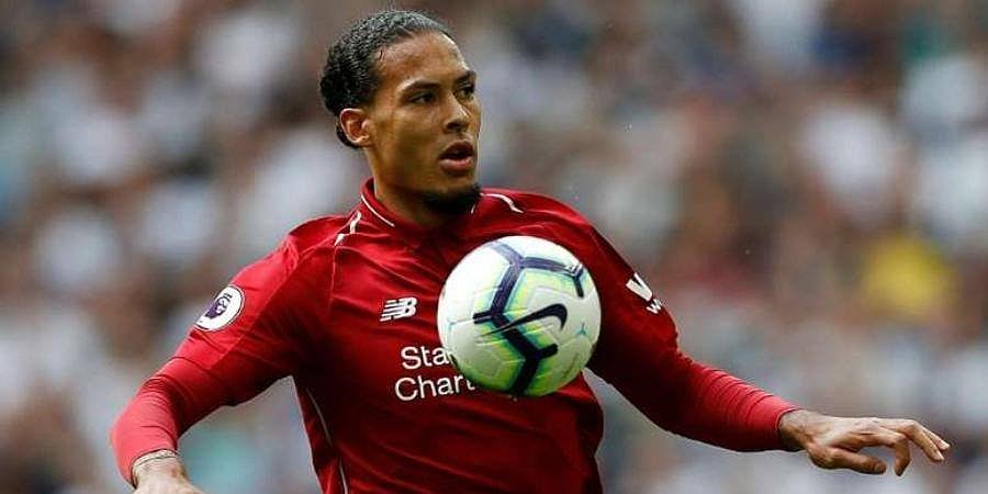 ফন ডাইককে বিশ্বসেরা ডিফেন্ডার মানেন না রিচার্লিসন। ফাইল ছবি