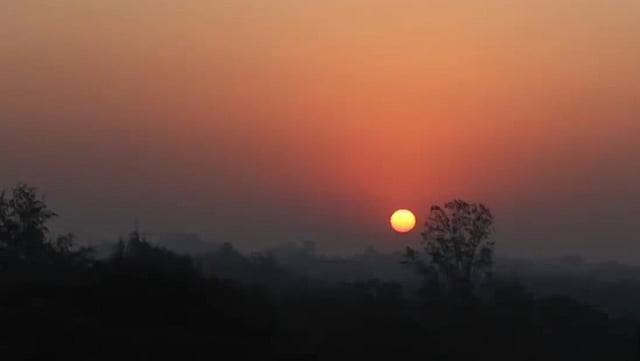 একটি রক্তিম সূর্য। একটি নতুন দিনের সূচনা। ডালপা, বাঙ্গরা বাজার, মুরাদনগর, কুমিল্লা, ২৪ জুলাই। ছবি: মো. রাকিব হোসেন