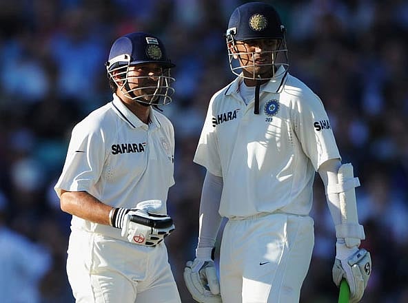 টেন্ডুলকারের মতো ক্রিকেটারের সঙ্গে খেলে স্বকীয়তা ধরে রাখা কঠিন। সে কঠিন কাজটিই করে দেখিয়েছেন রাহুল দ্রাবিড় সব সময়। ছবি: এএফপি