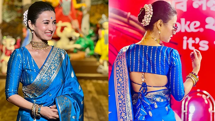 সোনালি ফ্লোরাল পাড়ের নীল শাড়িতে মোনামী ঘোষ