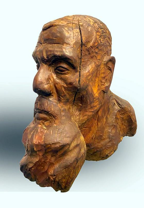 কাঠখোদাই। শিল্পী তৌফিকুর রহমান