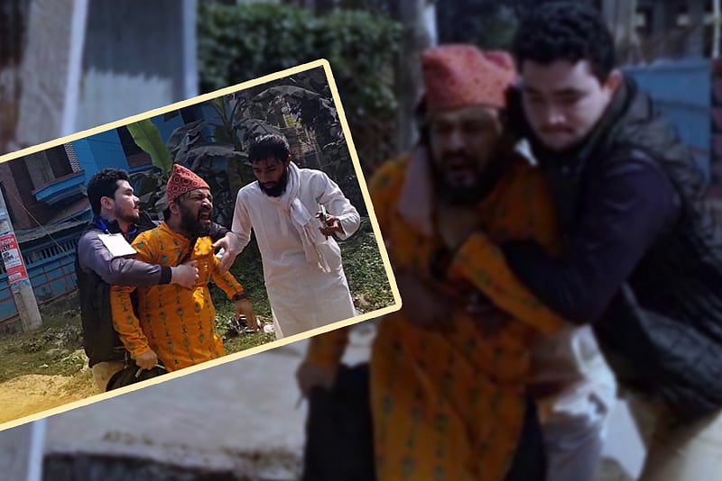 শিক্ষককে হেনস্তা করে টেনেহিঁচড়ে নিলেন চাকসু নেতারা