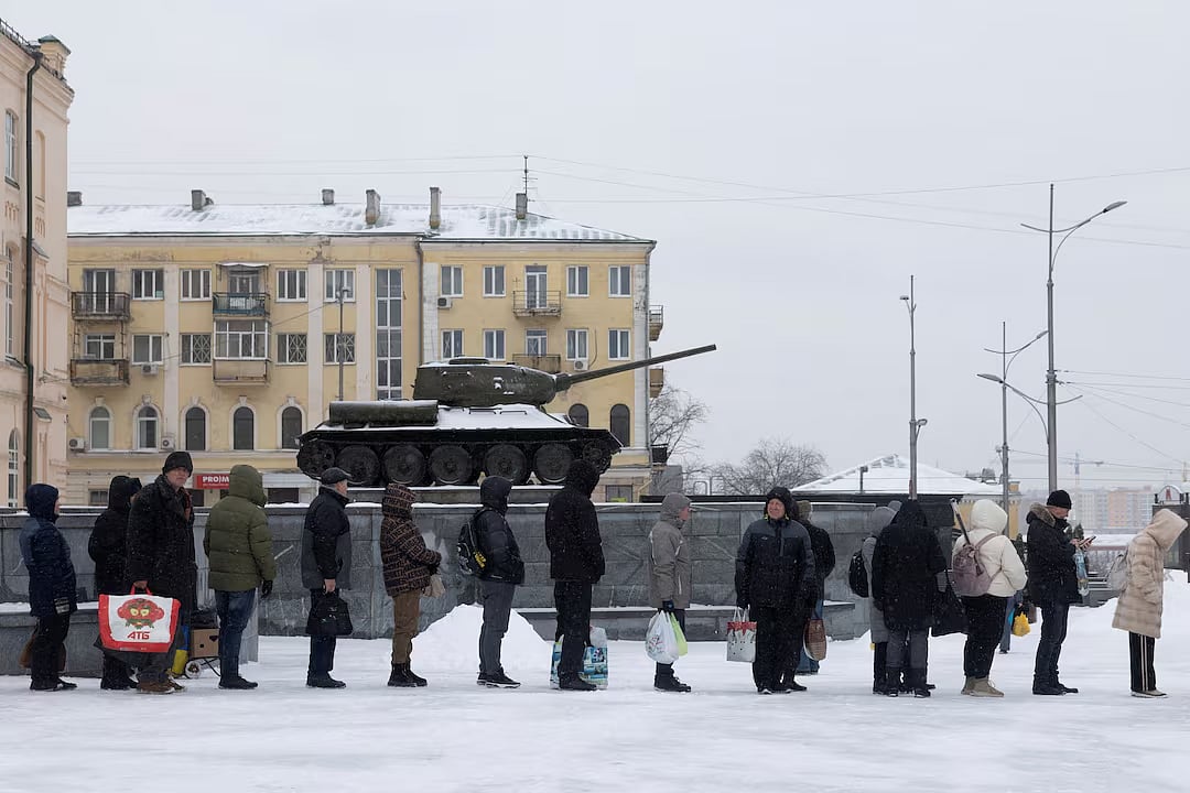 Ukrainian citizens wait at a bus station in sub-zero temperatures. Kharkiv, January 31, 2026.