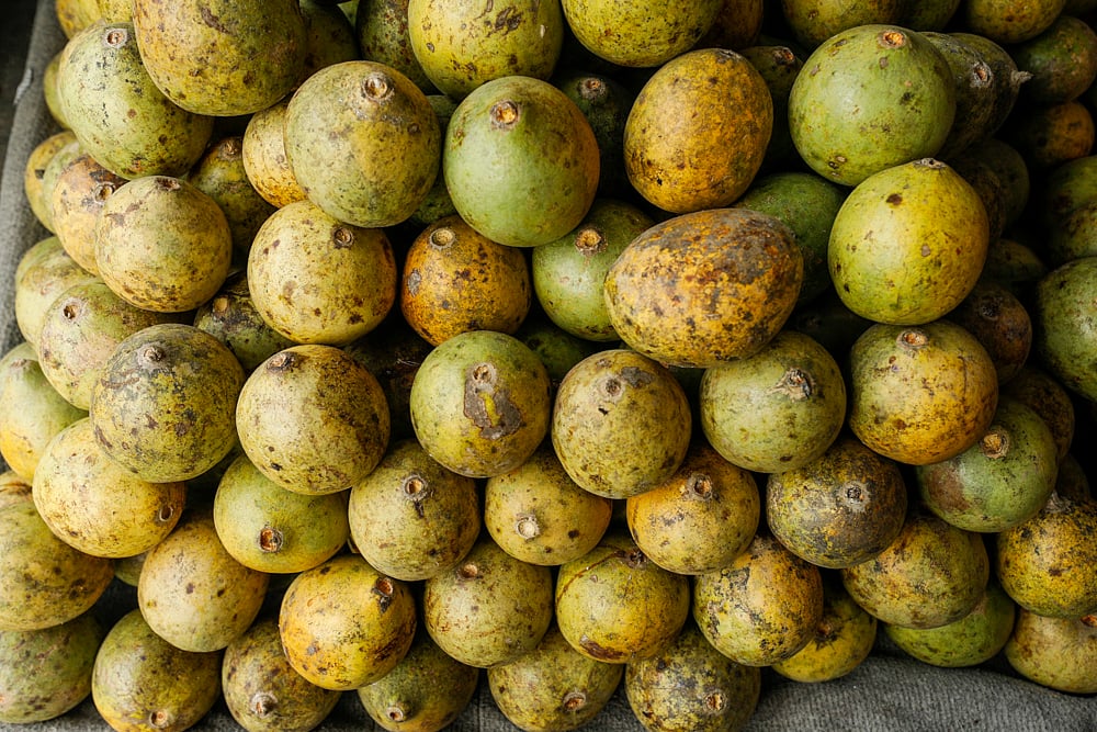  আড়তে রাখা পাকা বেল 