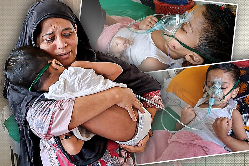 ‘আব্বা, আমার ডাক শুনতে পাও?’—জলাতঙ্কে অচেতন সন্তানের পাশে মা