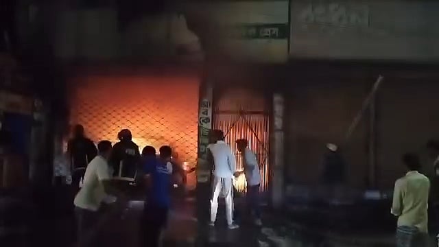 Seventeen people were rescued from a rooftop after a hotel parking fire in Shariatpur